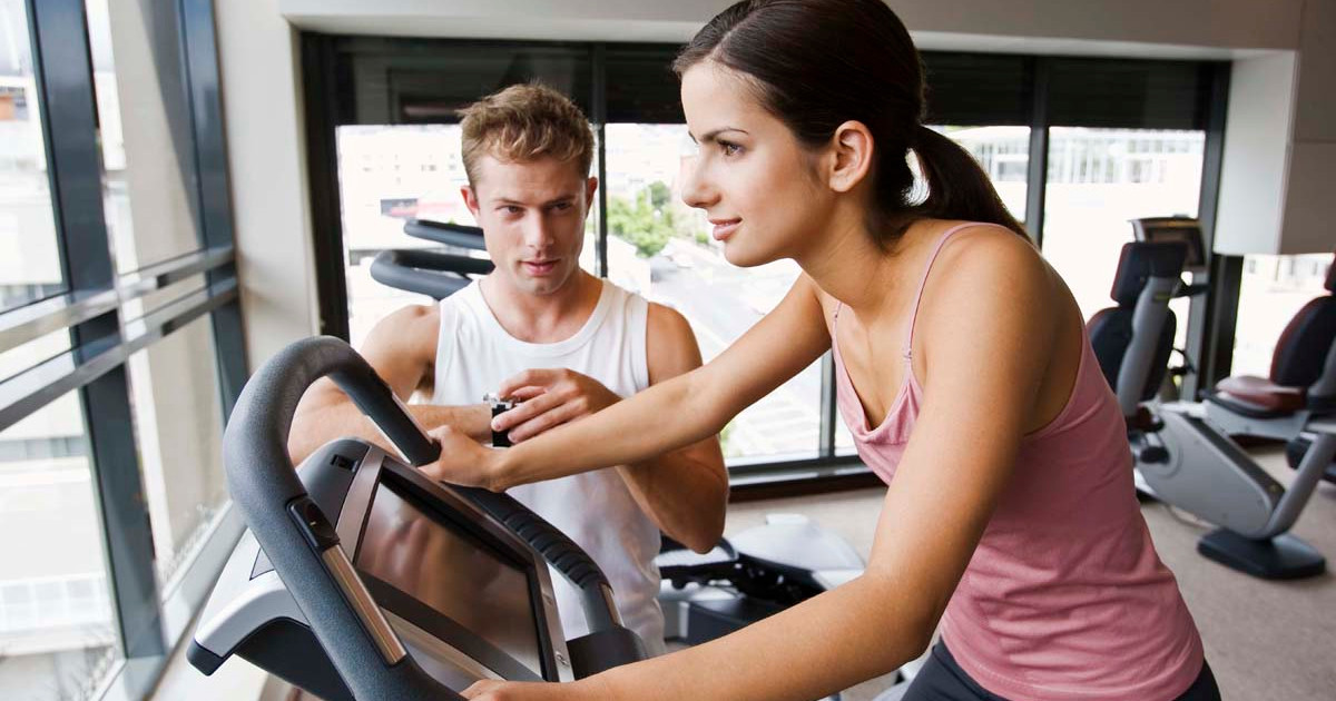 A person walking with confidence after a pain procedure while working with a physiotherapist on an exercise program.