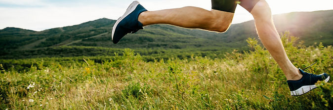 athlete runner run on summer mountain plateau in sunset_edited_edited.jpg