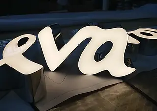 Luminous letter signs showing custom illuminated logos