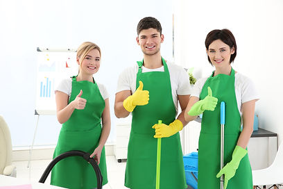 Service-team-home-cleaning-in-green-unif
