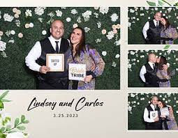 wedding guests using photo booth at wedding
