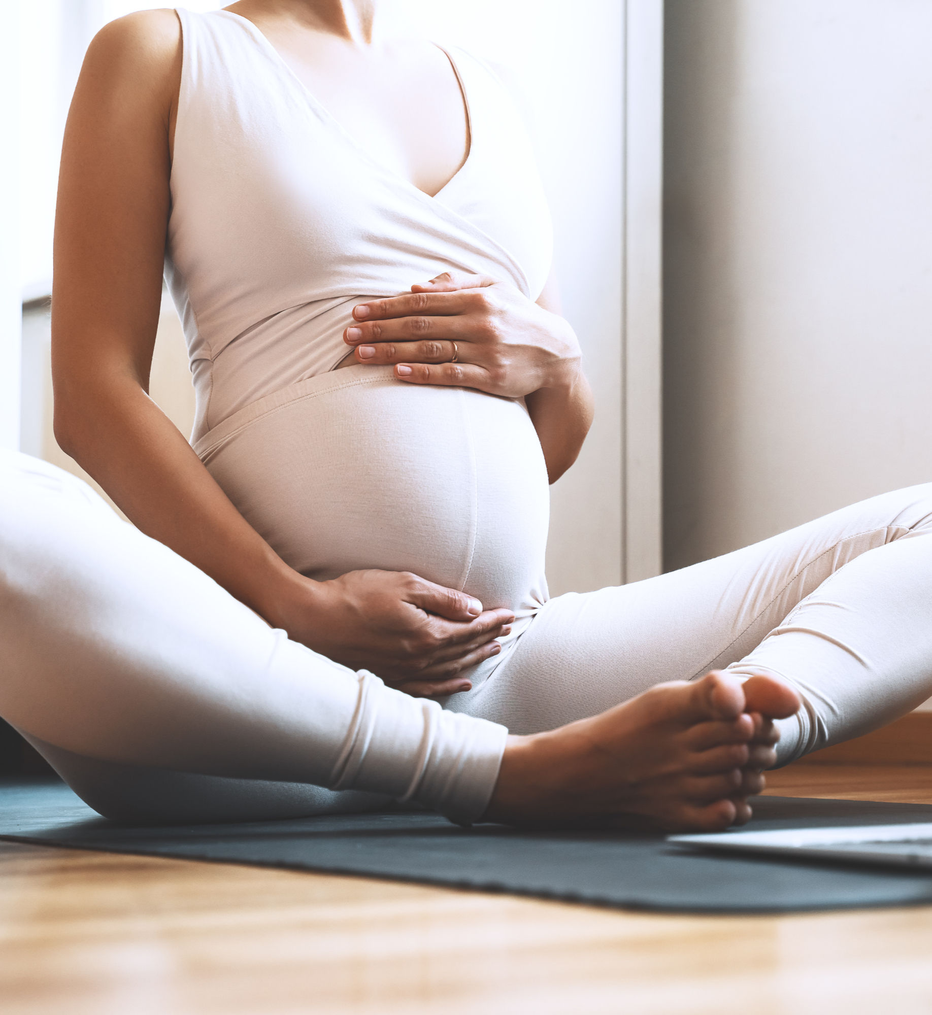 Pregnancy yoga restorative posture deeply relaxed