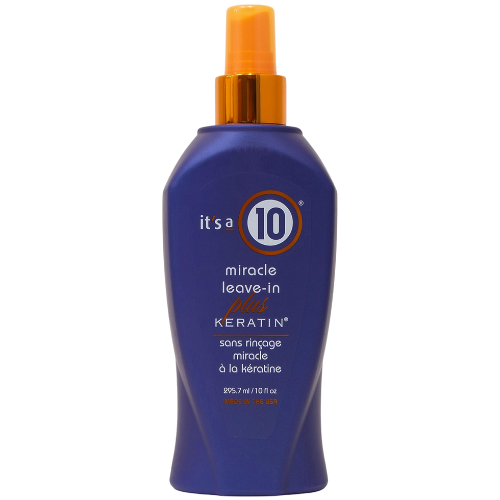 Blue It’s a 10 Miracle Leave-In Plus Keratin bottle with orange cap on white background, product label visible.