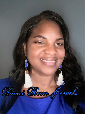 Elegant handcrafted polymer clay dangle earrings, showcasing artisan jewelry from a Black-owned jewelry store.