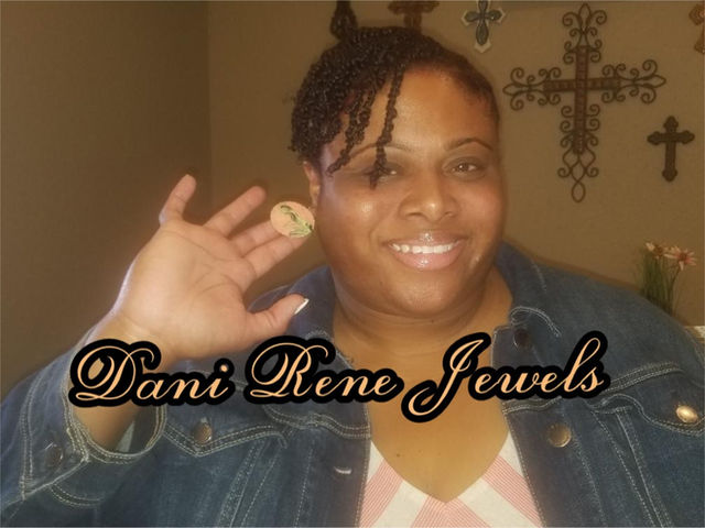 Elegant handcrafted polymer clay dangle earrings, showcasing artisan jewelry from a Black-owned jewelry store.
