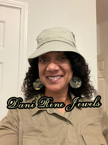 Elegant handcrafted polymer clay dangle earrings, showcasing artisan jewelry from a Black-owned jewelry store.