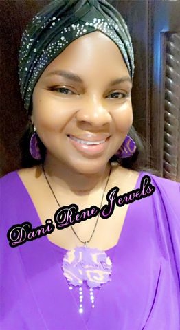 Elegant handcrafted polymer clay dangle earrings, showcasing artisan jewelry from a Black-owned jewelry store.