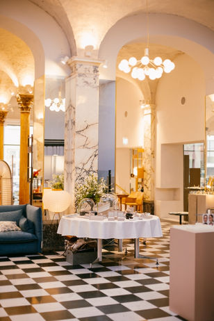 "Event photography capturing jewellery designers showcasing their creations at the Jewellery Room showroom during Copenhagen Fashion Week.