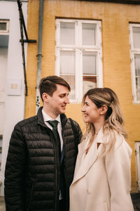 Bride and groom taking posing during their elopement in Copenhagen