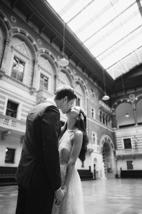 Bride and groom kissing at City Hall Copenhagen