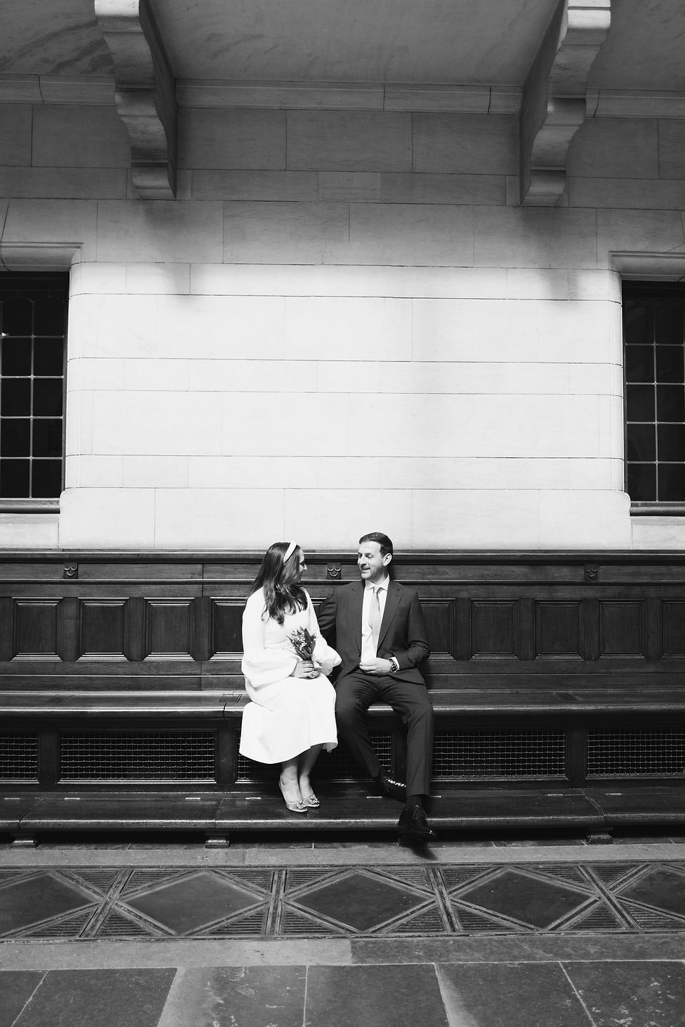 Intimate elopement ceremony held in the ornate corridors of Copenhagen City Hall, symbolizing their union in the heart of the city