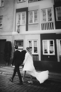 Couple during wedding photoshoot in urban streets in Copenhagen