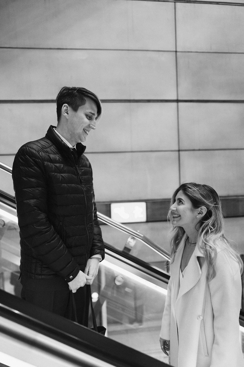 Bride and groom taking metro in Copenhagen