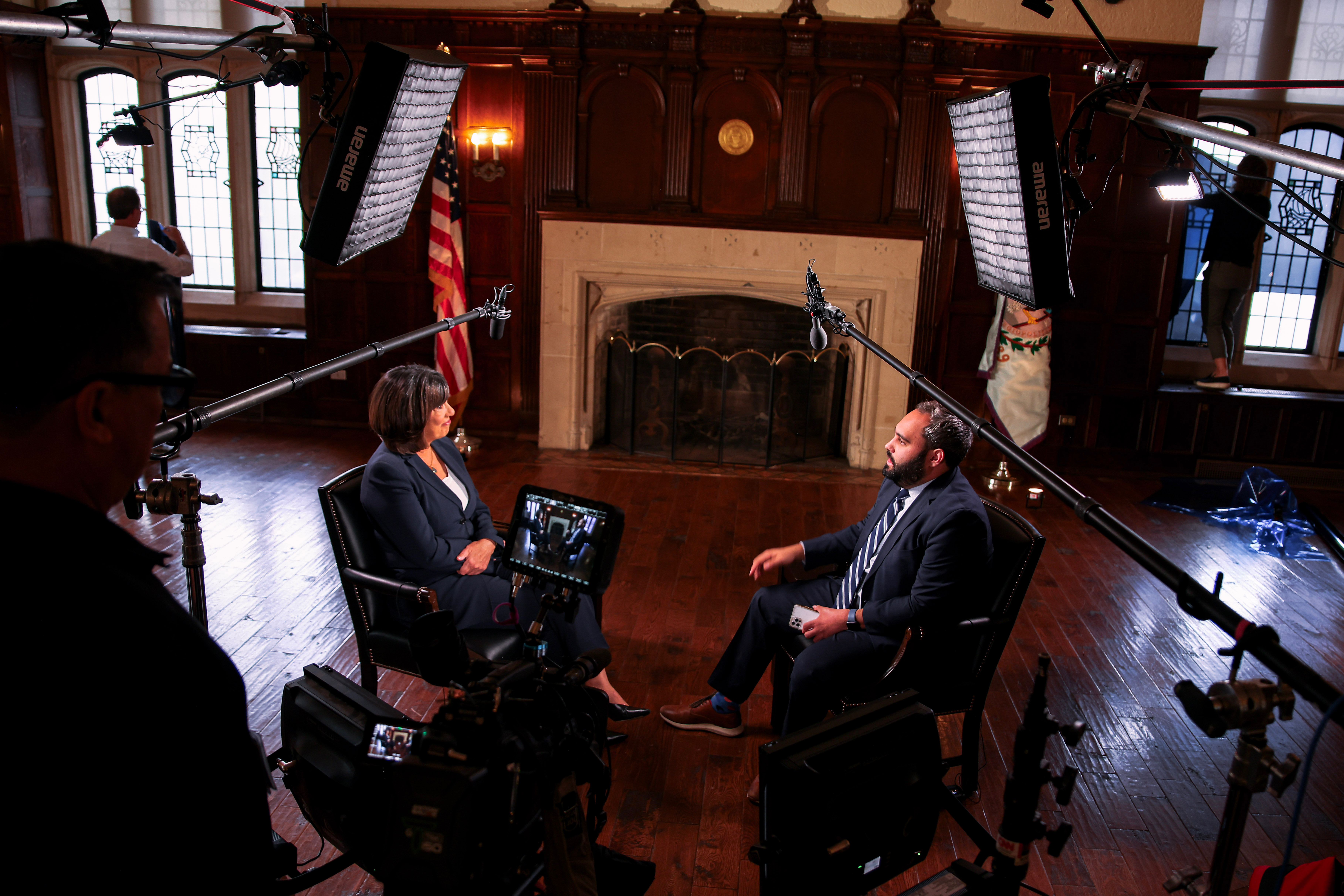 Crew filming a sit-down interview with a national figure