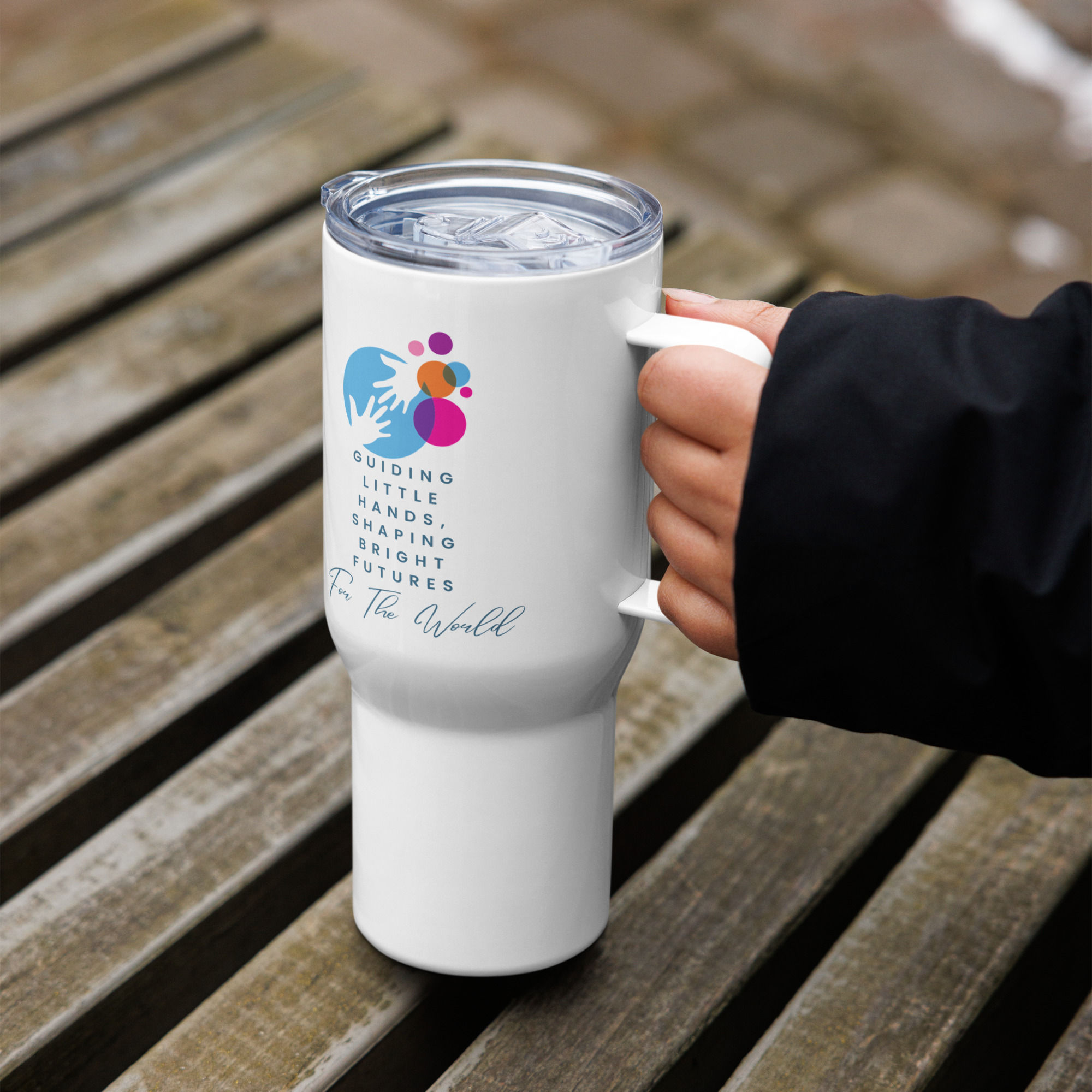 Travel mug with a handle Guiding little hands...