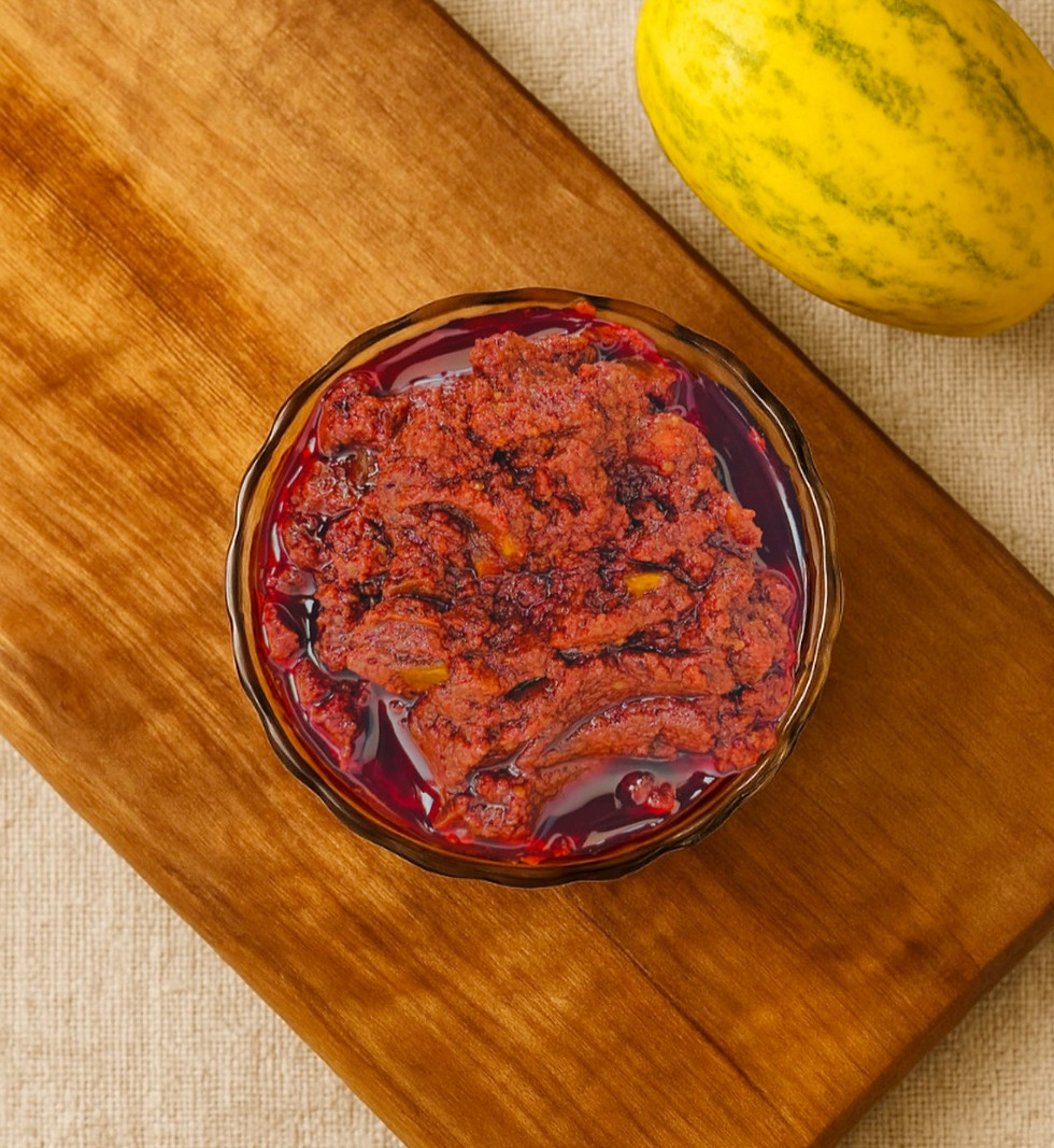 Dosakaya Avakaya pickle served in a bowl with pieces of Dosakaya and spice mix