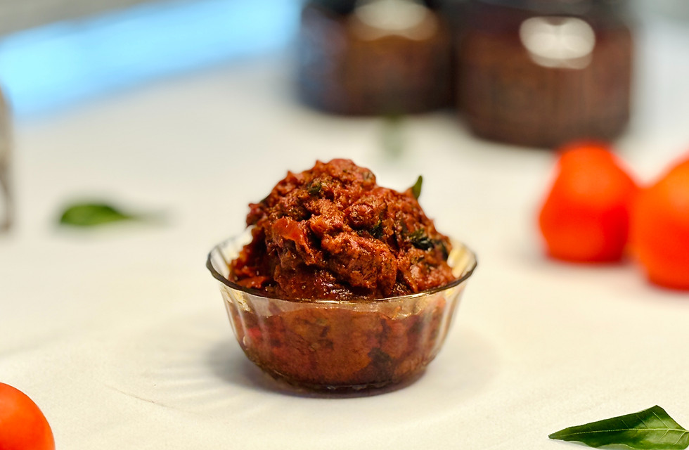 A thick, rich, jammy, and deep red Andhra-style Tomato Pickle.