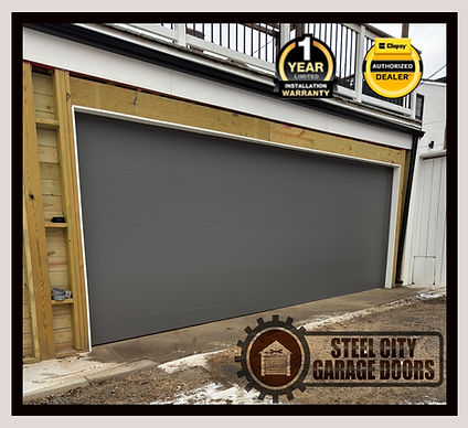 Charcoal finish garage door installation in Pittsburgh PA by Steel city garage doors .jpg