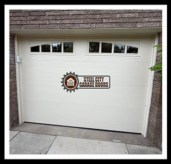 Clopay Modern Steel in almond finish with madison arch 613 by Steel city garage doors Pitt