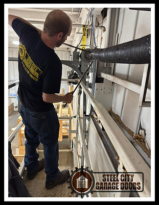 Commercial garage door springs Pittsburgh PA Steel city garage doors