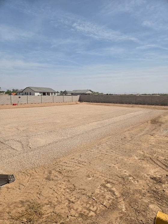 Residential pad preparation for new home construction with precise grading