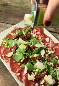 * Carpaccio de bœuf , parmesan et roquette*
