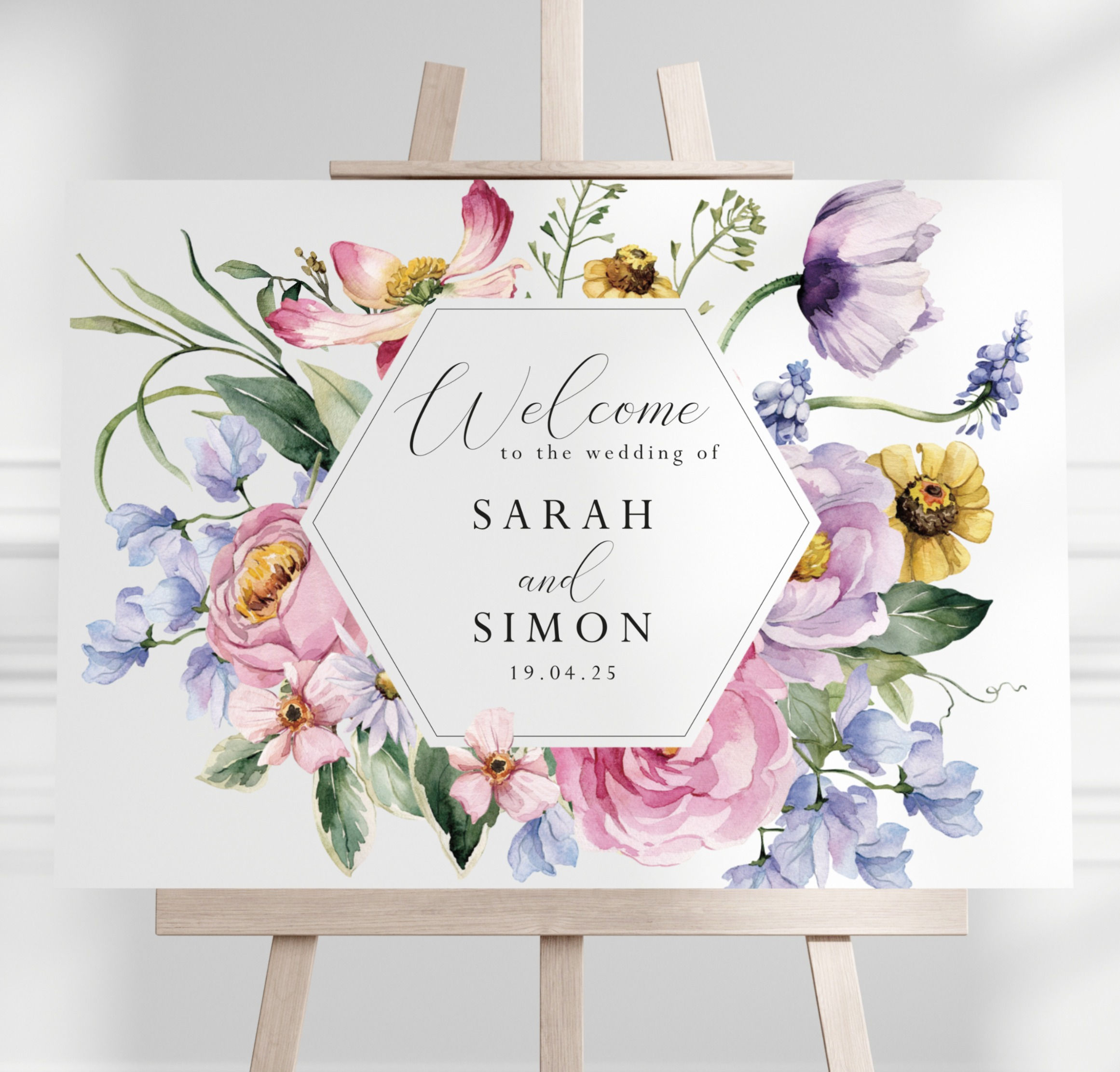 Pastel flowers welcome sign for wedding