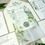 Thumbnail: Greenery wedding invitation with printed botanical vellum wrap