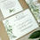 Thumbnail: greenery invite wrapped in a printed botanical vellum with green leaves, botanical elements, garden foliage and leafy accents