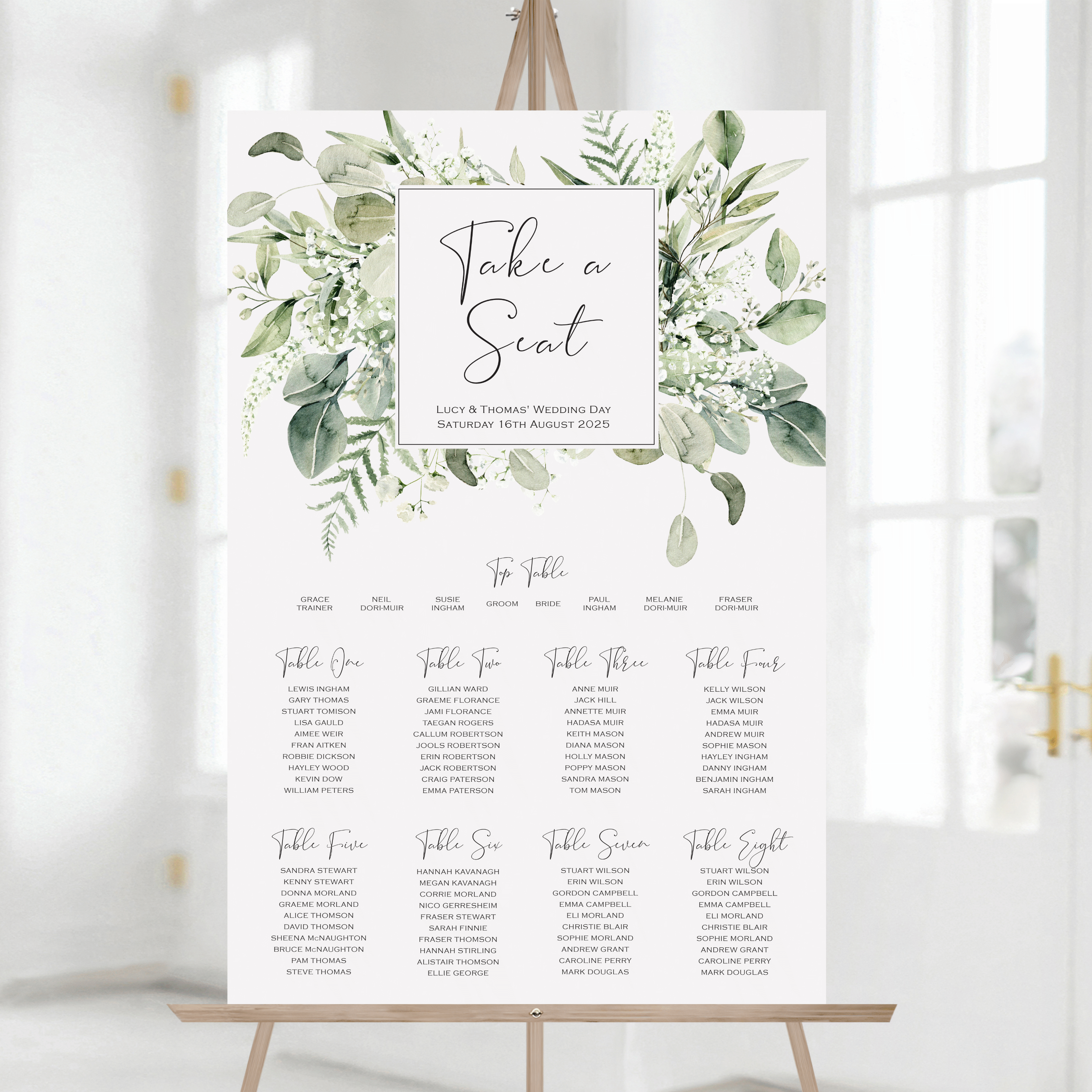 This large table plan is covered in lush green foliage and delicate leaves