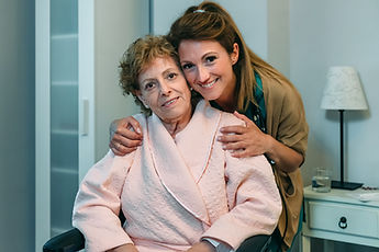 affectionate-caretaker-posing-with-elderly-patient-2021-08-30-05-56-10-utc.jpg