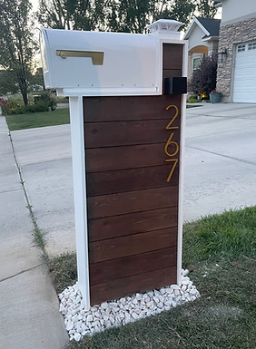 Custom luxury cedar wood locking mailbox tower installed by contractor Coastal Pergolas in Orange County, California.