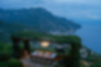 An exquisite dining experience at Hotel Caruso, with sweeping views of the Amalfi Coast at twilight