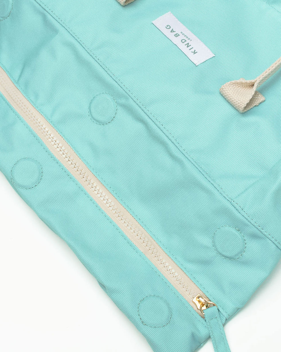 BACKPACK_CLOSEUP-MED-SeafoamGreen-flap-web-4by5