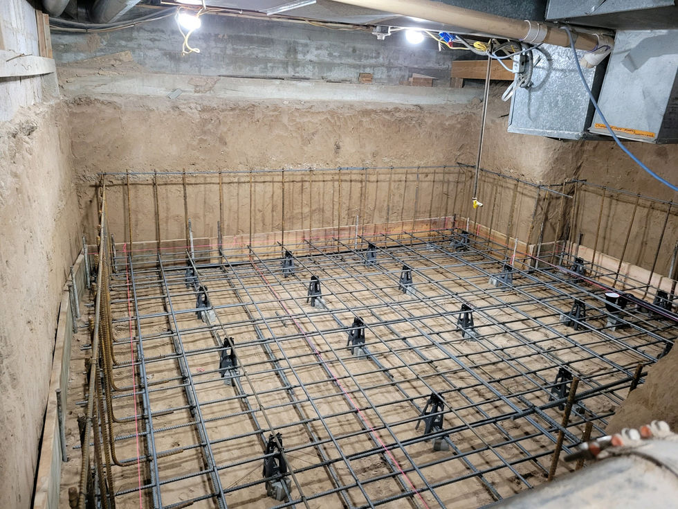 Rebar on chairs to ensure complete coverage of bar