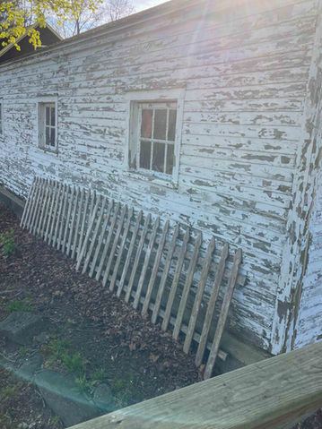 before picture of peeling paint on siding for a siding, painting, and reframing project in Lebanon CT