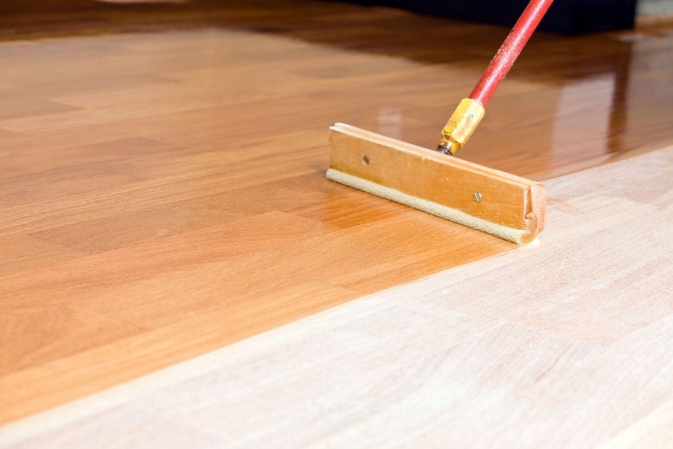 applying wood floor finish with applicator for smooth protective hardwood coating