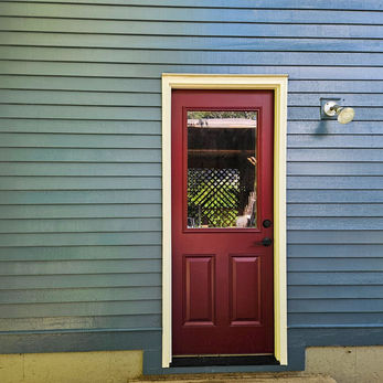 Newly framed and installed composite exterior door on a 1980’s home in Lebanon CT
