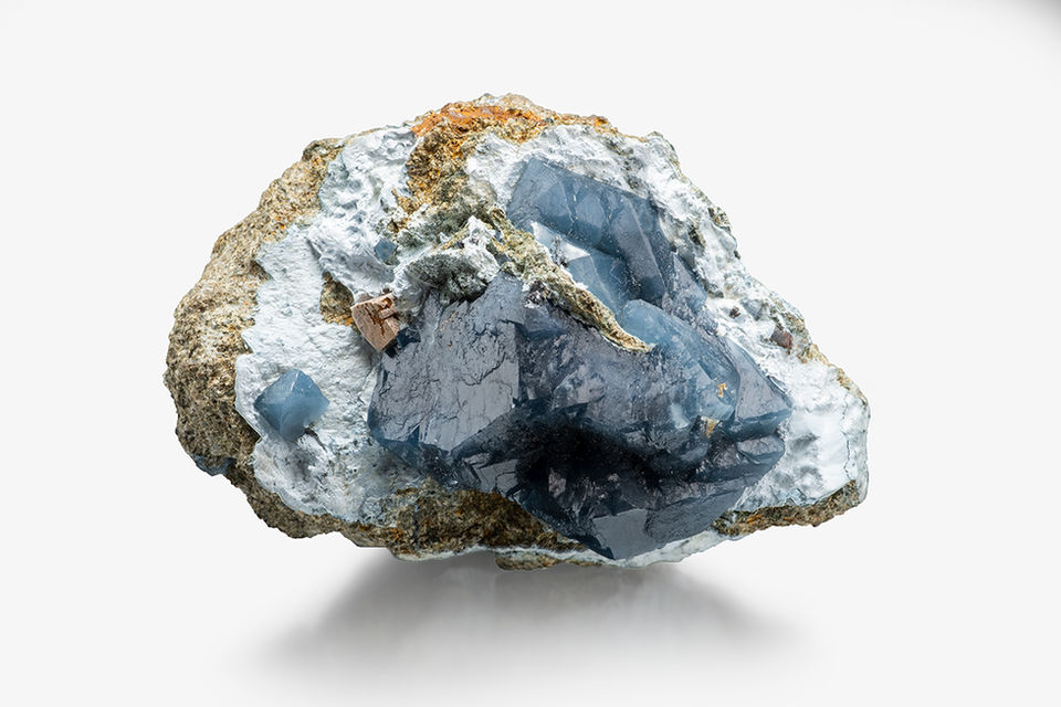 4.9 centimeter blue quartz on magnesio-riebeckite 