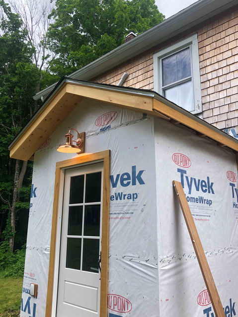 Photo of Tyvek sheathing on the exterior of the entryway project in Andover, CT.