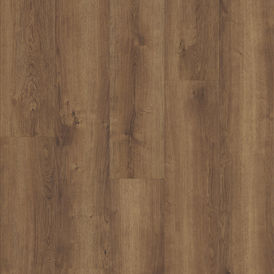 coretec pro classics monterey oak luxury vinyl plank flooring featuring rich medium brown tones and natural oak wood grain texture