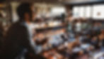 restaurant owner overseeing dining room with professional used cooking oil collection services from phibro renewoil