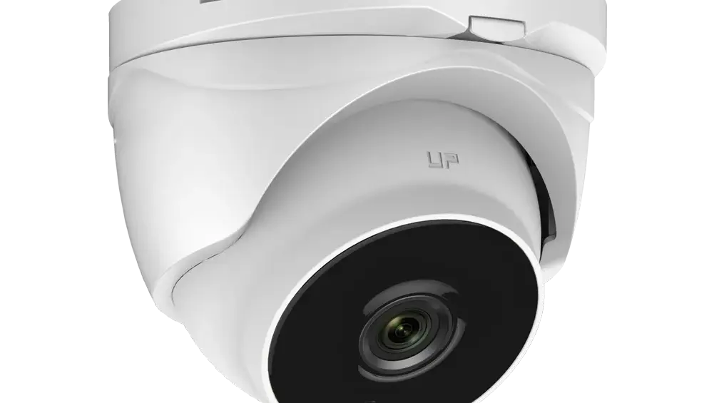 close-up of a white turret-style security camera with a black lens, mounted on a ceiling bracket.