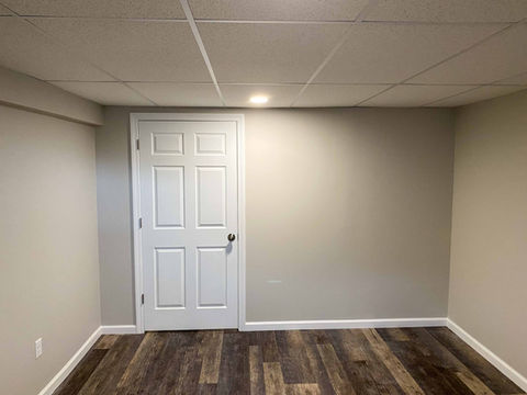 finished new drywall wall, door and trim interior basement remodel painting in Glastonbury CT