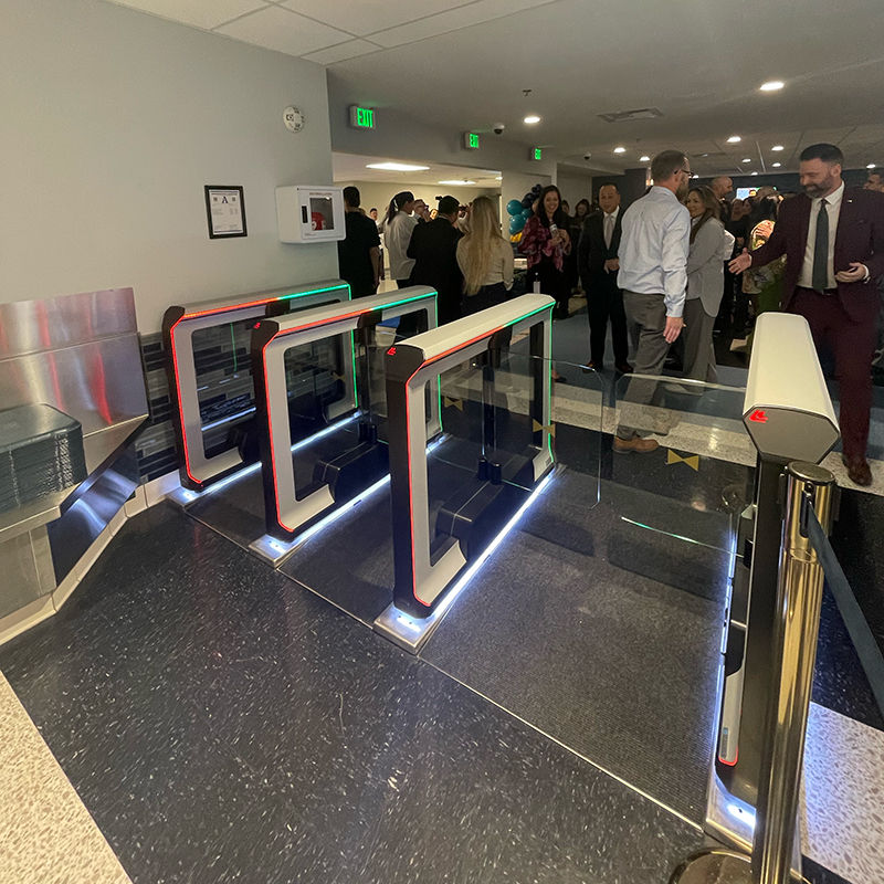 biometric optical turnstiles installed in a commercial office building for secure access control and identity verification