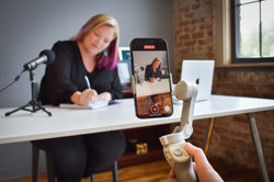 Michelle A. Mercier Working at Table