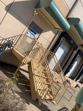 railing and staircase built for outdoor walkway of a warehouse