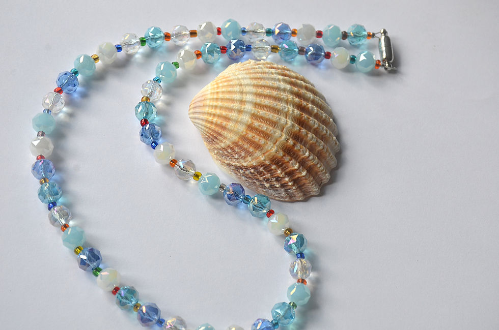 Thumbnail: Ocean Sunset Faceted Glass Beaded Necklace with Multi Coloured Sunset Seed Beads