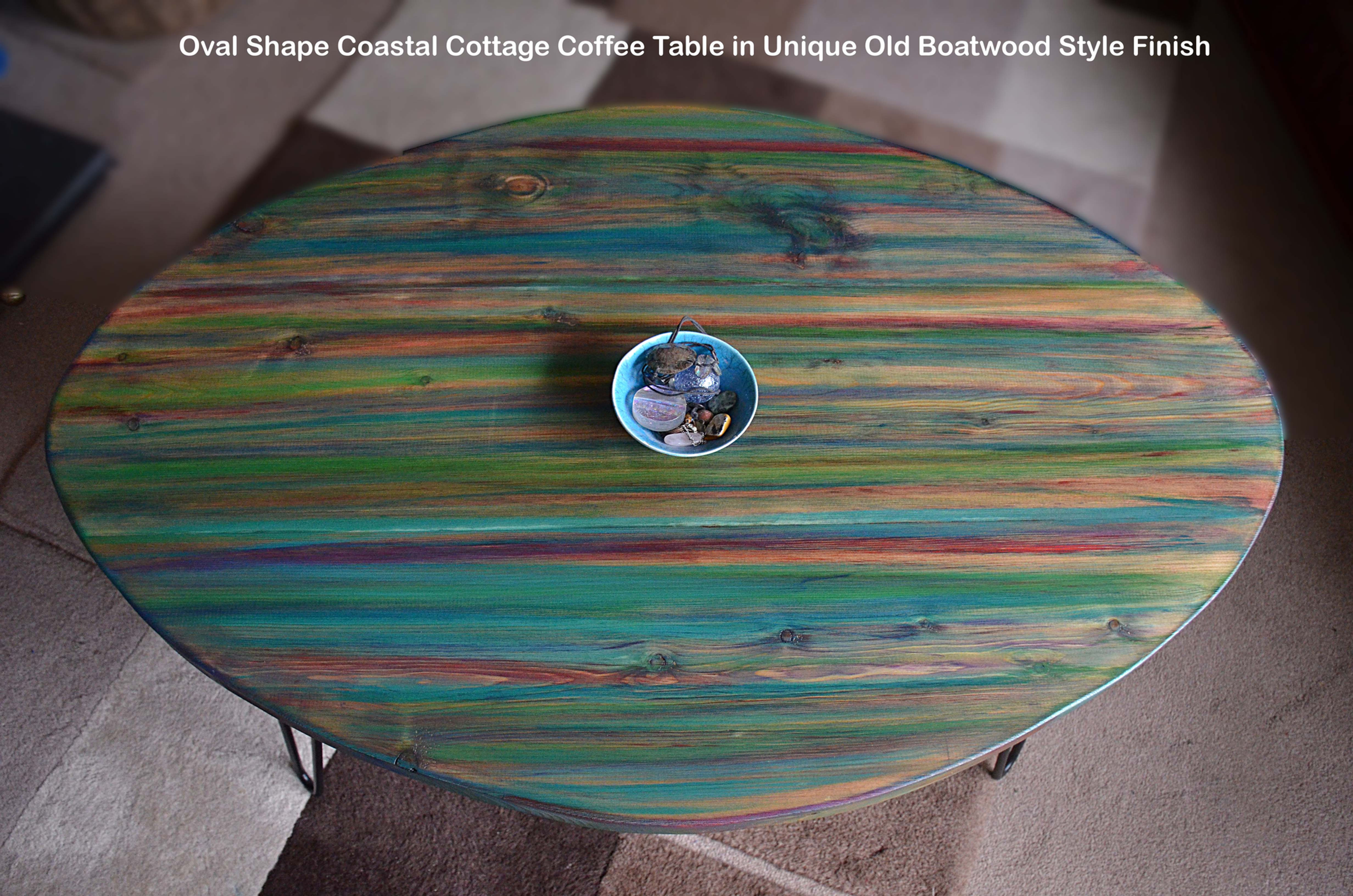 Oval Wood Coffee Table in our Old Boatwood Style Finish Muted Red Green Blue