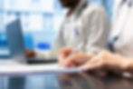 physician-writing-prescription-treatment-plan-help-with-recovery.jpg
